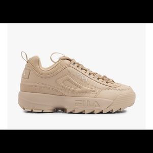 Beige Fila Disruptors